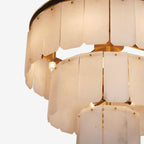 Elegant Tiered Alabaster Chandelier - illuminated close-up