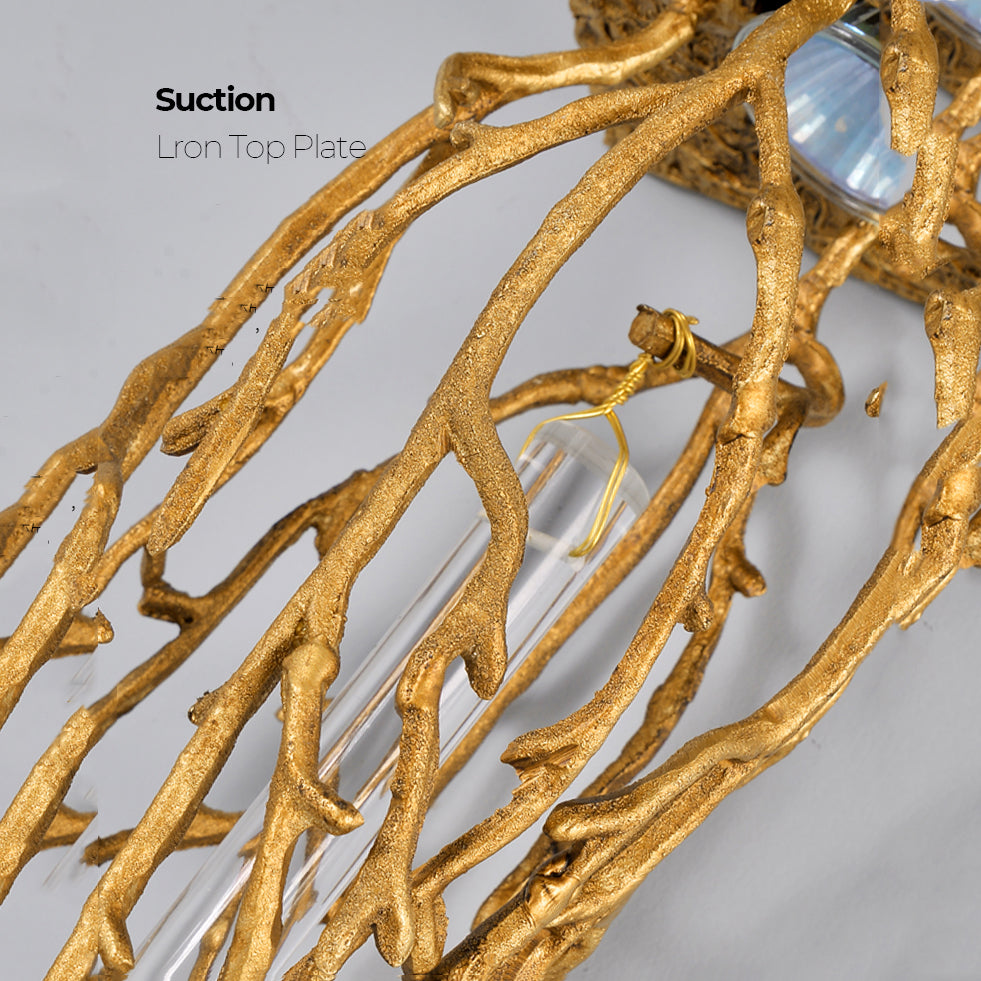Slade branch crystal wall sconce - close-up of the textured gold branch frame